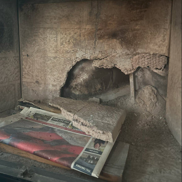 It can be hard to source new brick Fireplaces panels with the originals have become cracked or damaged.  The massive hole in the back of this firebox will make it impossible to pass inspection, and it would not be safe to use.  Canadian Forge is now casting custom refractory panels to restore older fireplaces into better than original condition.