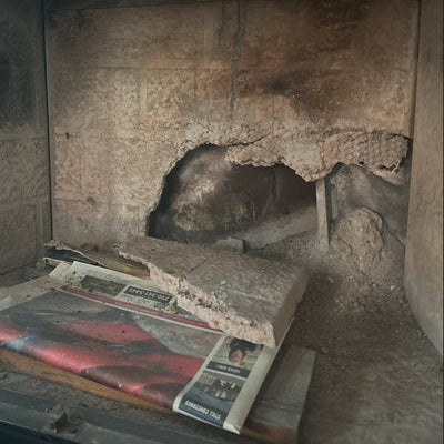 It can be hard to source new brick Fireplaces panels with the originals have become cracked or damaged.  The massive hole in the back of this firebox will make it impossible to pass inspection, and it would not be safe to use.  Canadian Forge is now casting custom refractory panels to restore older fireplaces into better than original condition.