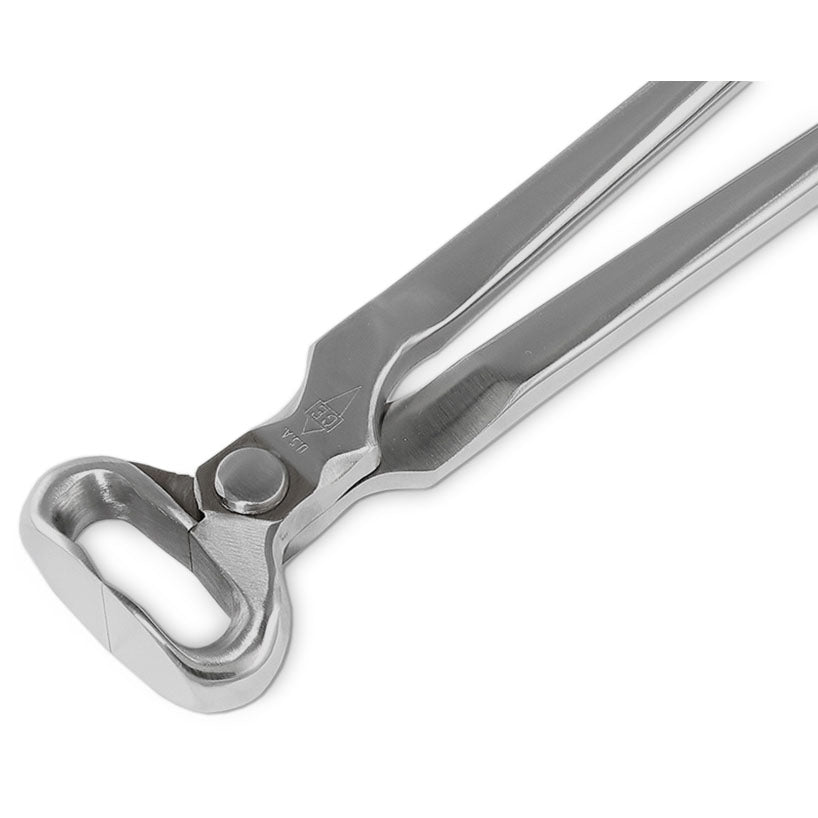 Canadian Forge & Farrier hoof nipper, stainless steel, close-up of sharp cutting edge.