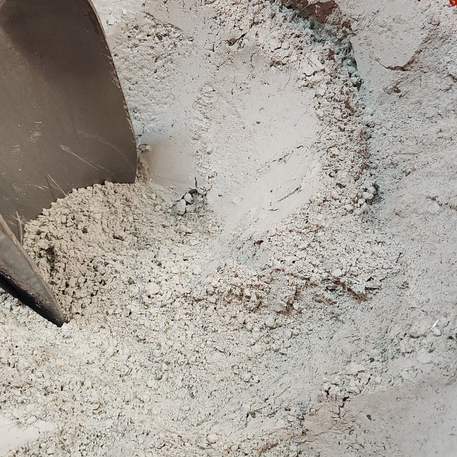 Canadian Forge & Farrier Ultra Express 70 castable refractory powder with shovel, high alumina content.