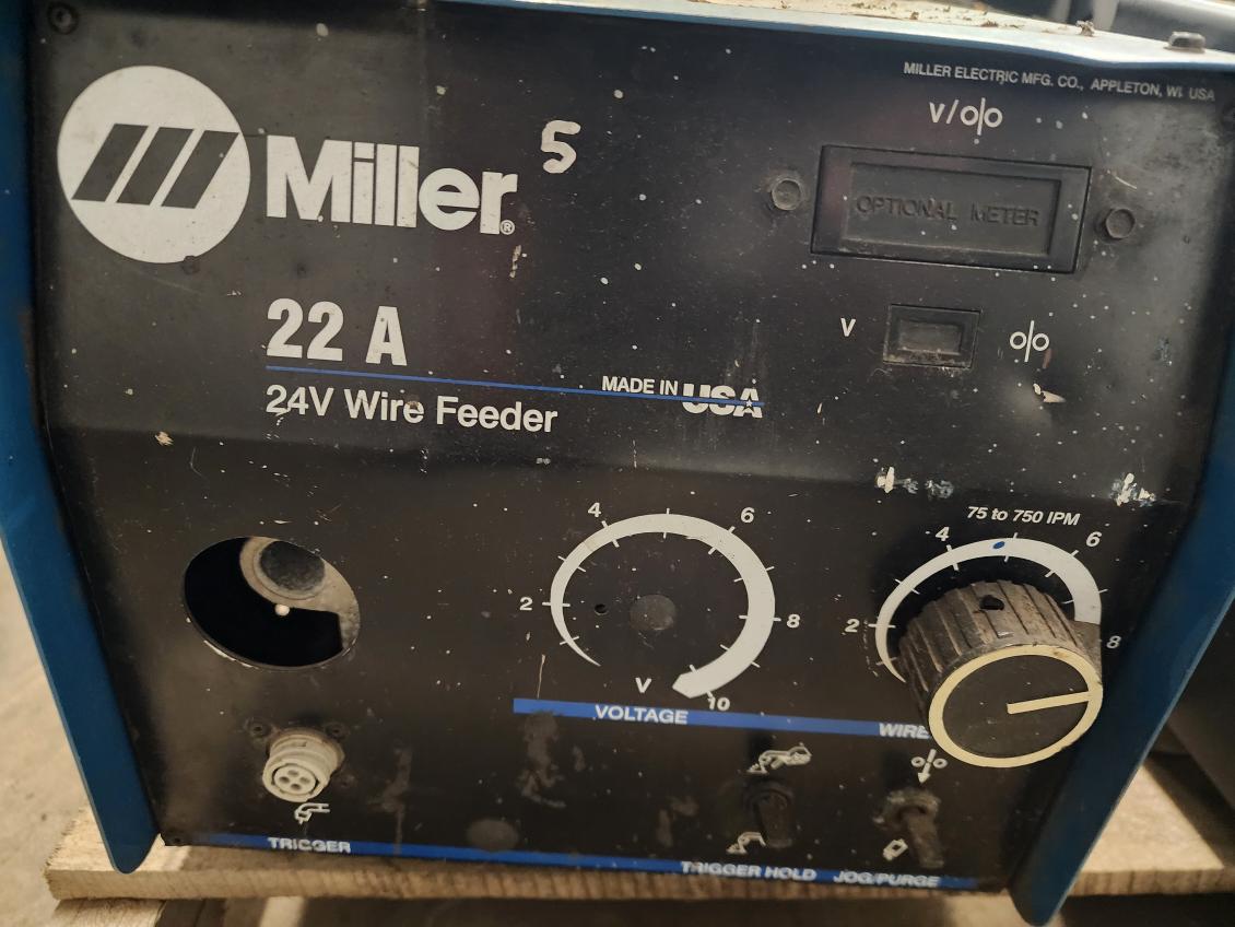 Skid of 5 used welding wireline Feeders.  4 Miller & 1 other.