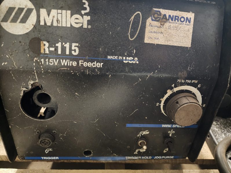 Skid of 5 used welding wireline Feeders.  4 Miller & 1 other.