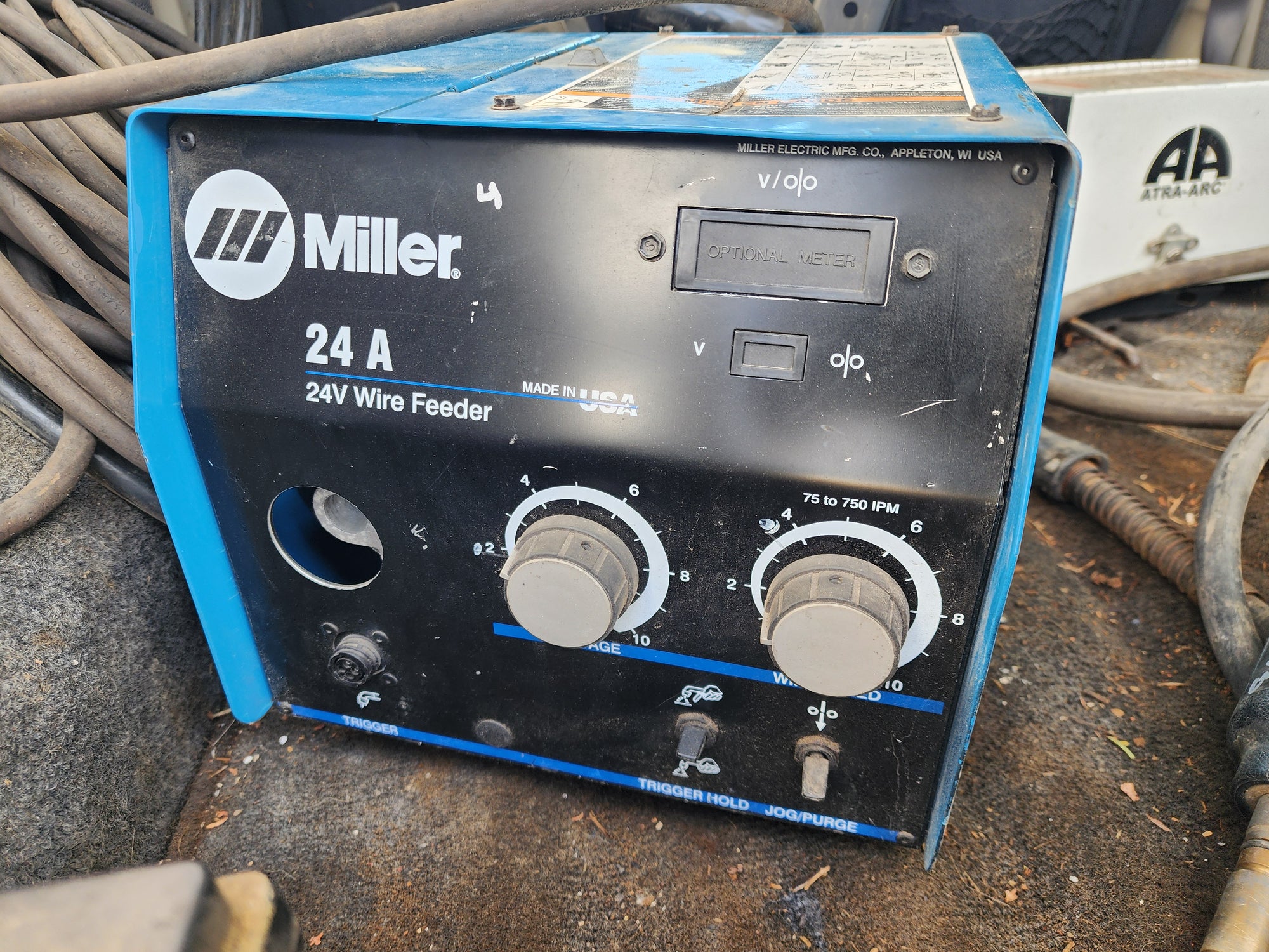 Skid of 5 used welding wireline Feeders.  4 Miller & 1 other.