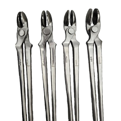 Precision Canada Le Czar Forging Tongs set with smooth round reins and deep depression heads for bar stock steel.